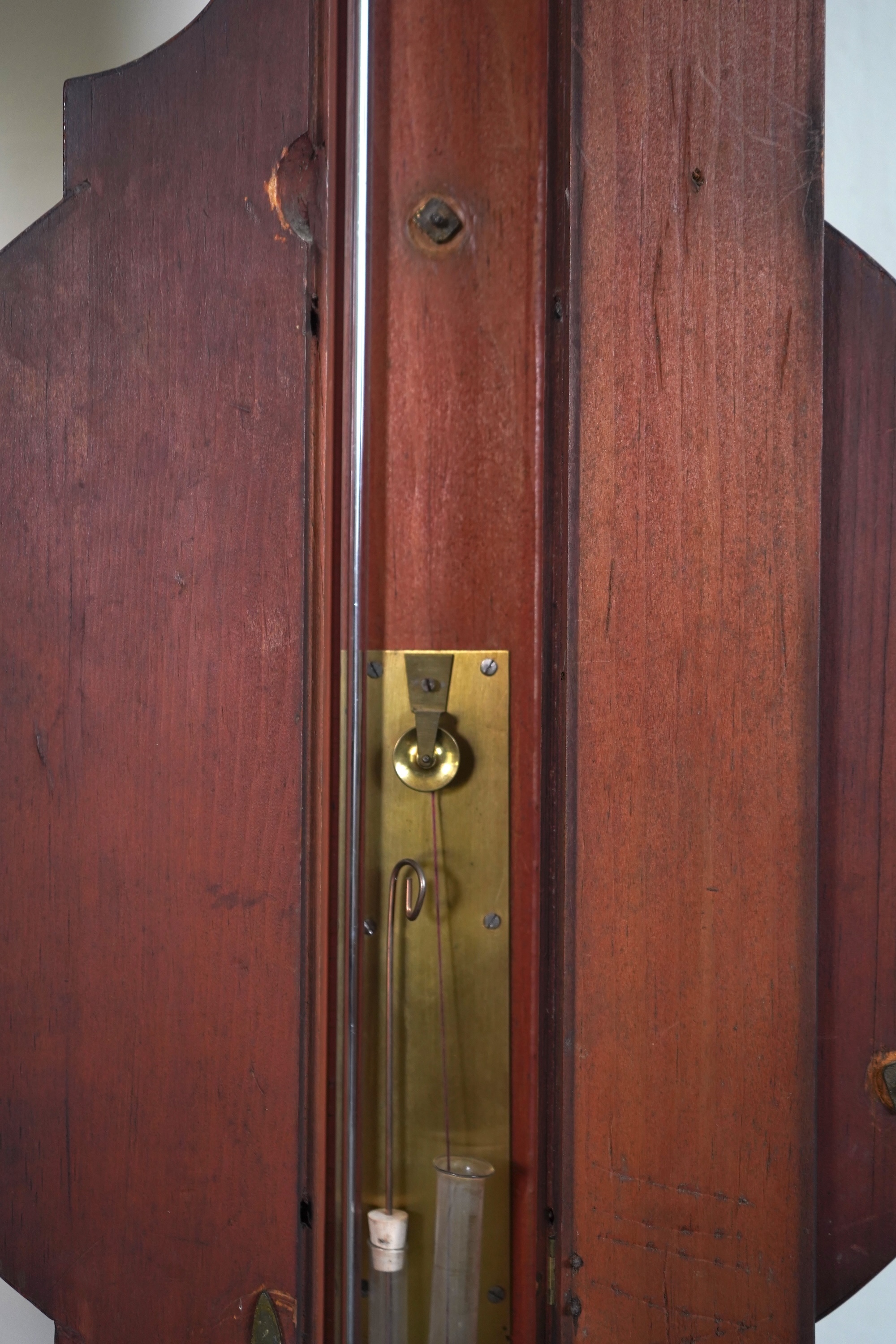 A large mid 19th century tulipwood banded mahogany wheel barometer, by C. Rimondi, Halifax